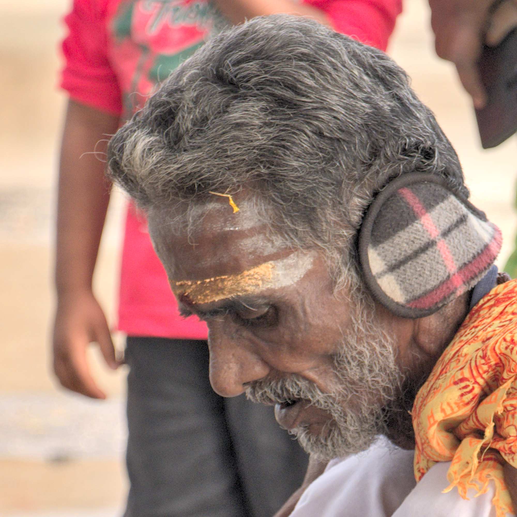 Männerkopf Hindu Ohrenschützer